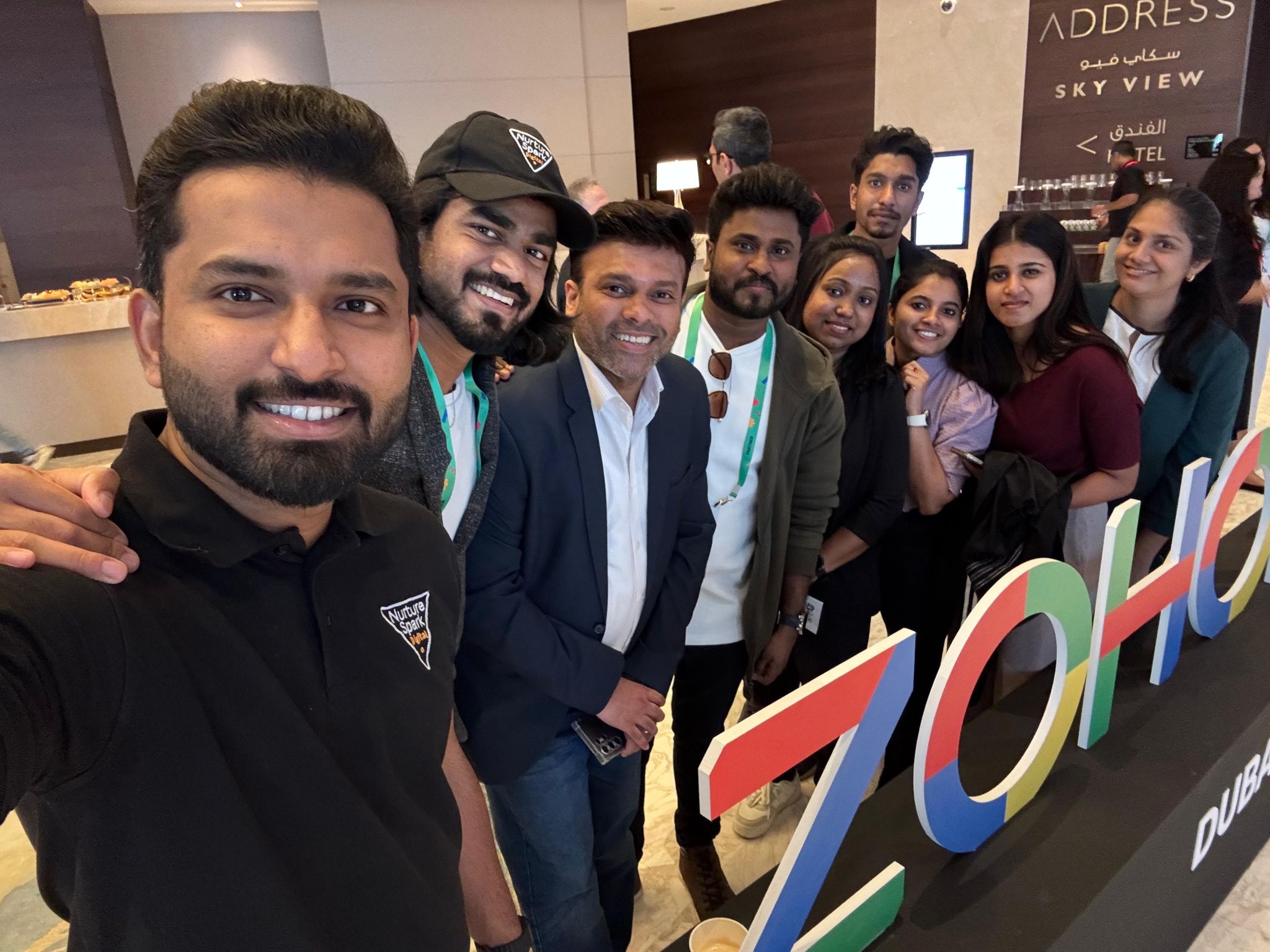 Nurture Spark team selfie at a Zoho event
